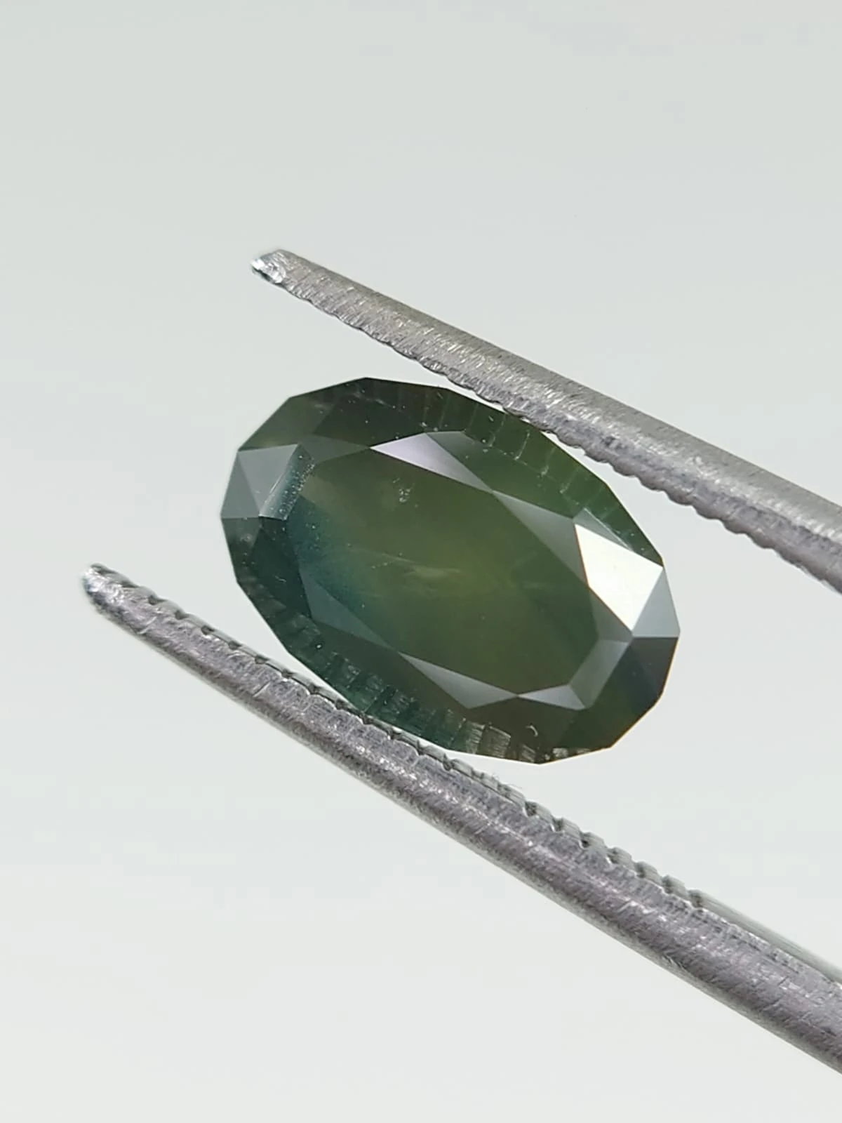 2.5ct Opalized Sapphire Fancy Oval Precision Cut from Nigeria — view 1